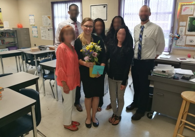 Brittany Summerhays in Classroom with Colleagues